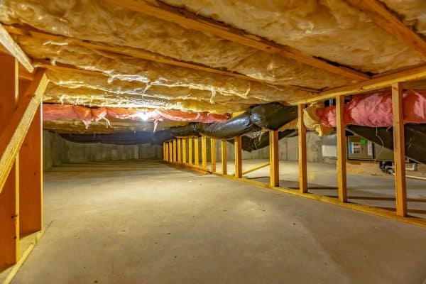 Basement floor insulation and wooden support beams. Pros & Cons Of Crawl Space Encapsulation For DIYers
