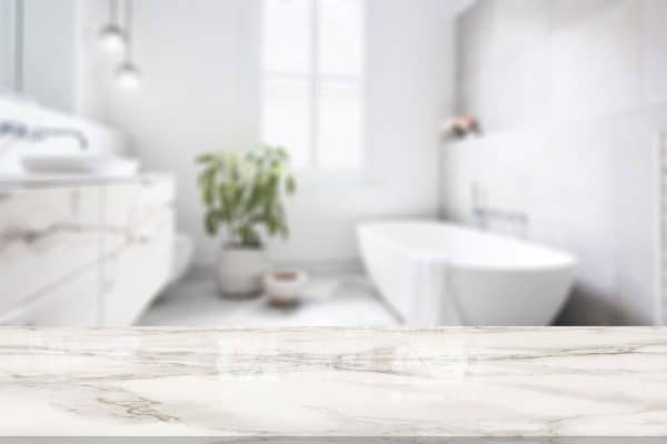 Table Top And Blur Bathroom Of The Background, Why Are My Bathroom Countertops Turning Yellow